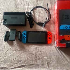 Nintendo Switch Console, Factory Reset In Box with Accessories, Neon Red + Blue